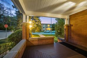 Front covered patio area and West entrance.