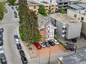 Parking for 10 vehicles behind the property, plus 6 zone underground sprinklers & low maintenance landscaping.