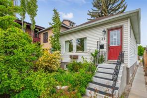 Great location on a quiet street. Welcoming front entry with pretty gardens.