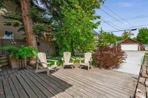 Behind the back deck you will find a paved parking lot for 4 vehicles